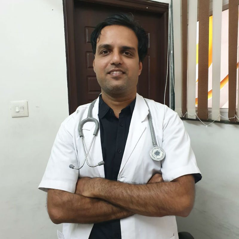 A doctor at the entrance of the Best Surgical hospital in Kota.
